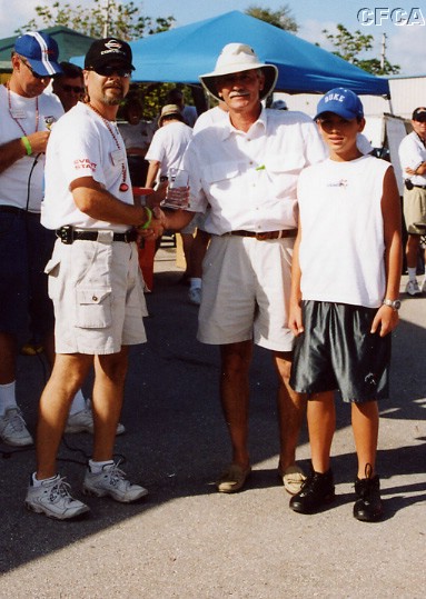 049.Larry Tallon and son accepting their C5-Early trophy.JPG