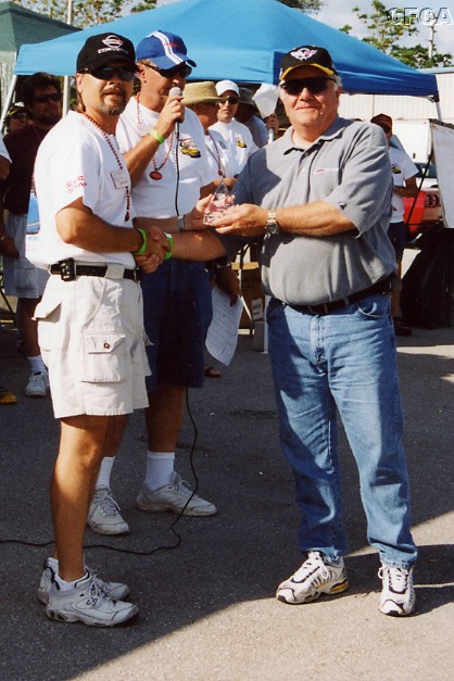 055.Jack Bulleit accepting his and Carol's C5-Late trophy.JPG