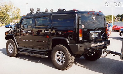 060.Don Ashe needed his H2 Hummer to carry all his prizes.JPG