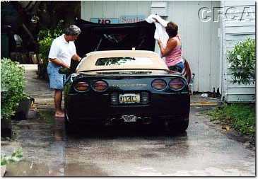 017.Kim and Lisa wash down the 'Lexus'.jpg