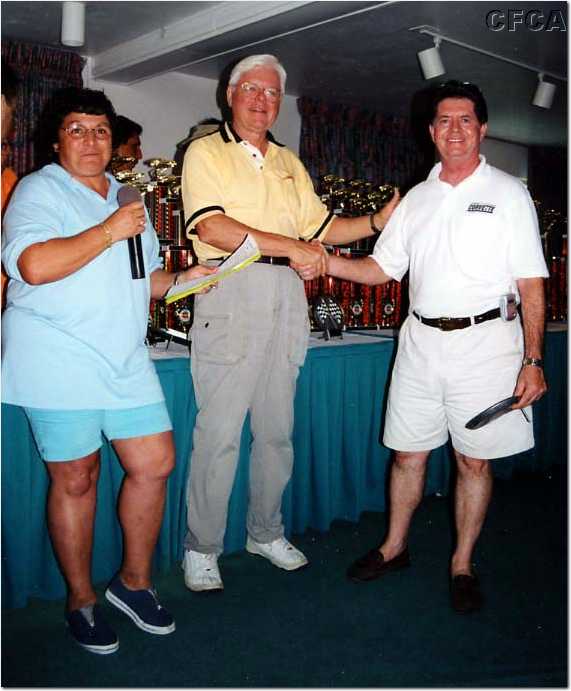 082.Bill accepting his C3 trophy from Marie and Dave.jpg