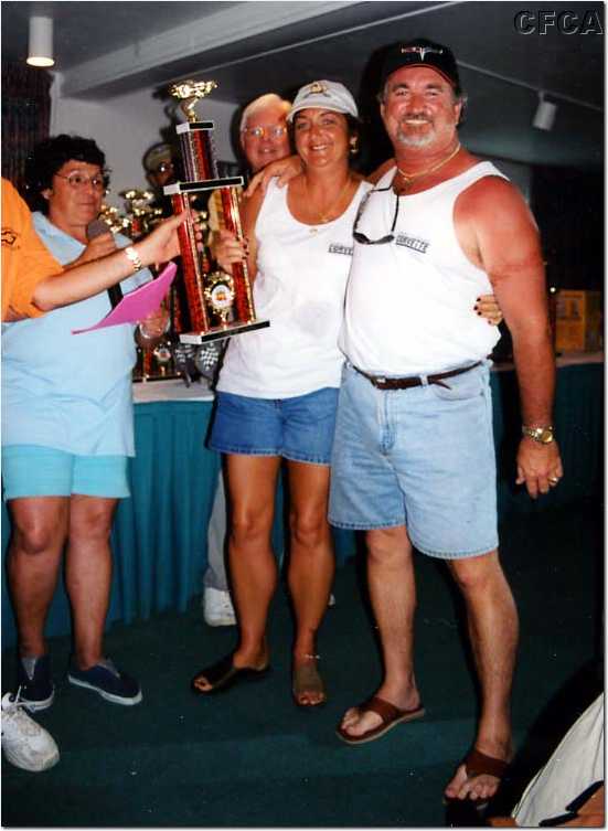 083.Lisa and Kim accepting their C5 trophy from Marie and Dave.jpg