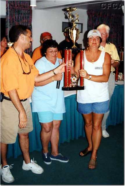 091.Lisa accepts CFCA's Club Participation trophy.jpg