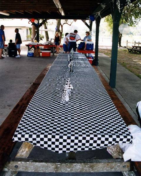 007.Pretty soon these checkered-flag tables would be filled with food.jpg