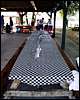 007.Pretty soon these checkered-flag tables would be filled with food.jpg