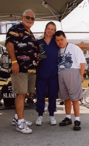 066.Joseph Depante accepting his Russell Home Children's Choice award for his '04 LeMans Blue Z06.JPG