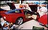014.This Magnetic Red C6 was one of three '05s at the show.JPG