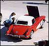 009.Mike and Debbie checking out Mark's '59 making sure it's clean.JPG