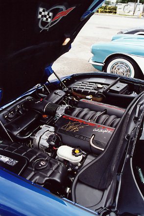 027.Kerry was able to display his multi-autographed valve covers.JPG