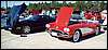 002.30 years of Corvette history separate Rich's black '89 and Mark's red '59.JPG