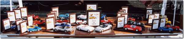 039.INCREDIBLE trophies---actual miniature Corvettes.JPG