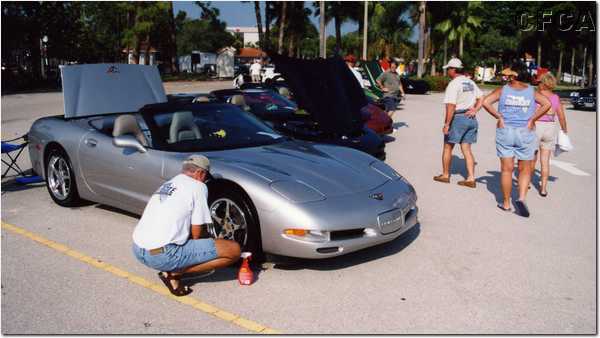 004.Ray puts the finishing touches on his and Rachelle's new Machine Silver '04.JPG