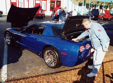 002.Hard-working Neal and his Electron Blue '02 Z06 get ready for the show.JPG