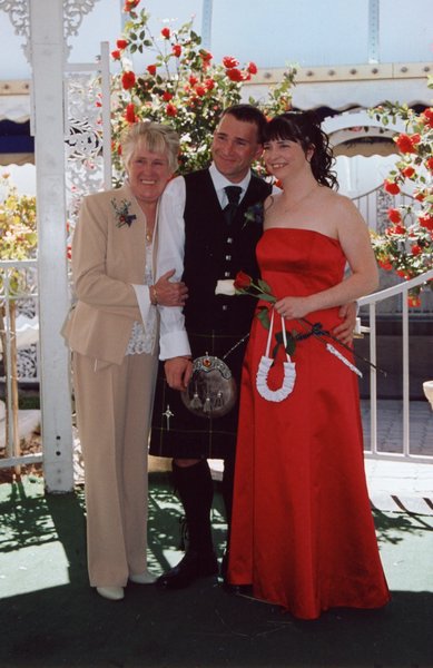 044.A very happy Eric with the two Mrs. Upfolds.JPG