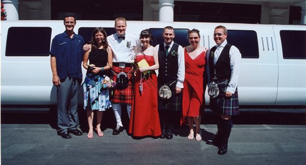 059.And we coerce Jeff and his Excursion to pose with the Scottish (and English) wedding party.JPG