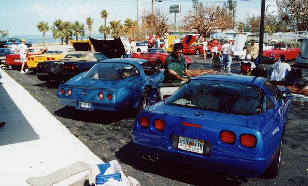 031.Ken was still hard at it on his and Barbara's Admiral Blue '94 Coupe.JPG