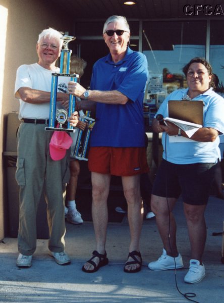 045.Gary accepts his and Lucy's C4 trophy from Dave.JPG