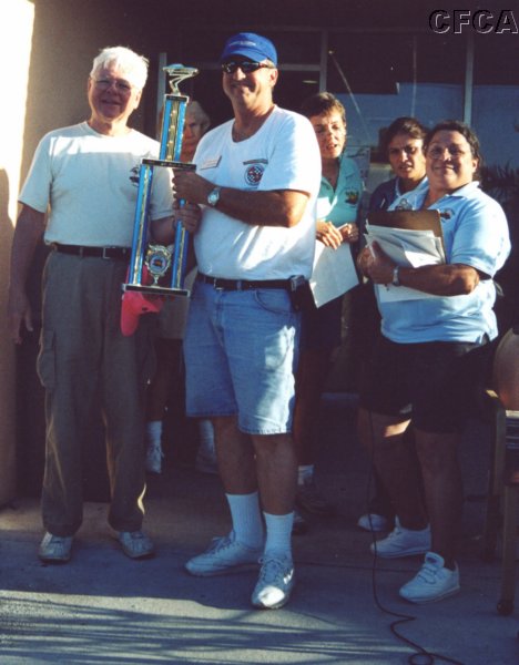 046.Hutch accepts his and Patti's C4 trophy from Dave.JPG