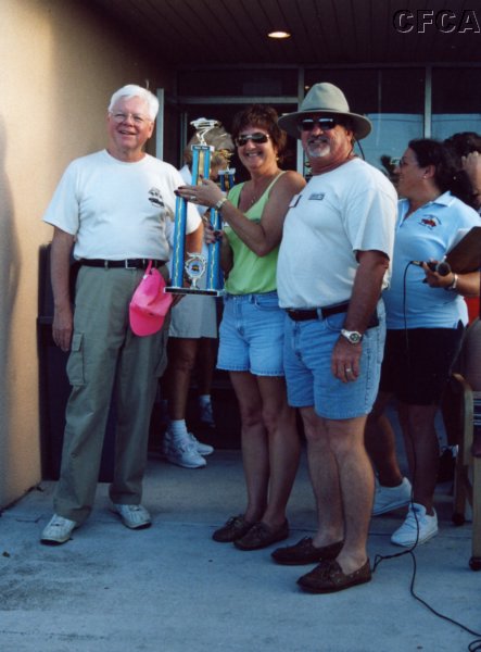 053.Lisa and Kim accepting their C5 trophy from Dave.JPG