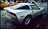 006.With his awesome, but understated Light Tarnish Silver C6 Coupe.JPG