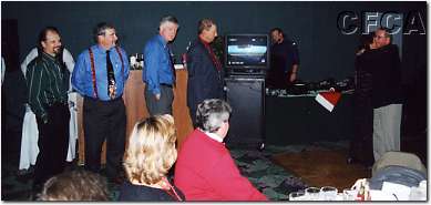 011.The men were lined up to dance with outgoing President Lisa.JPG