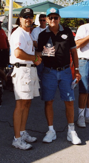 044.Chuck Deal accepting his C4-Early trophy.JPG