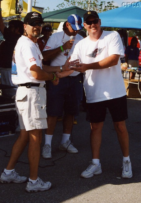 045.Gene Hastings accepting his C4-Late trophy.JPG