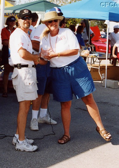 048.Helene Borozny accepting her and John's C4-Late trophy.JPG