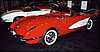 046.Where 2 Corvettes from each generation glistened under the lights.JPG