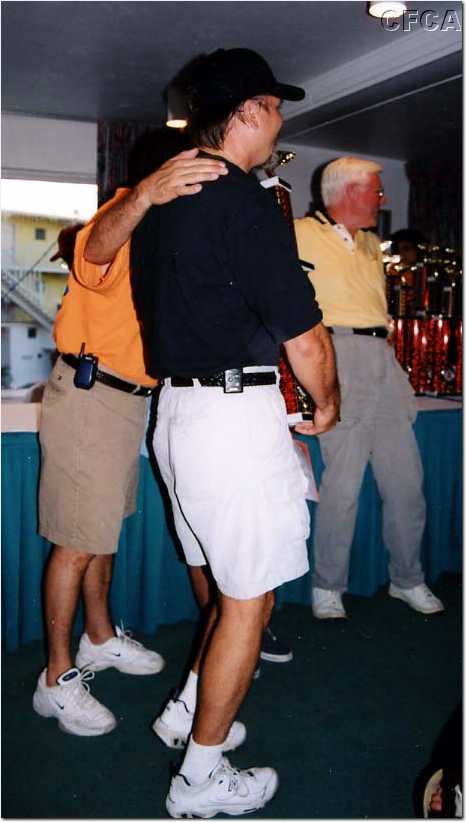 085.BJ (hey, turn this way) accepting his C4 trophy.jpg
