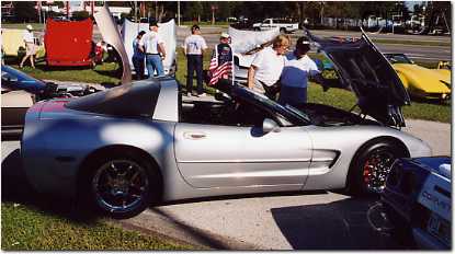 021.Christine and Rocky check out Bob's and Joyce's powerplant.JPG