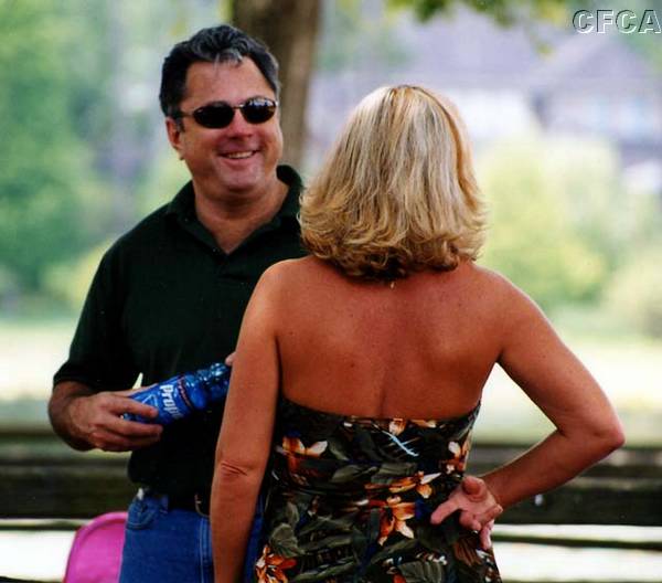 028.And who's the tanned babe Phil is talking with.jpg