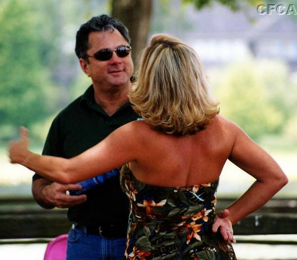 029.Well, whatever Carol is saying, she sure has Phil's undivided attention.jpg
