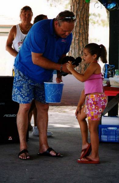 036.JD and his lovely assistant, Macey, select a door prize winner.jpg