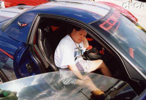 068.Newton checking out the interior of his winning selection.JPG