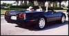 022.Henry and Cindi enjoy the beautiful morning in their beautiful black '94 convertible.JPG
