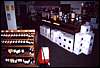 033.Meanwhile, inside, the little red wagons helped shoppers get their vino loaded.JPG