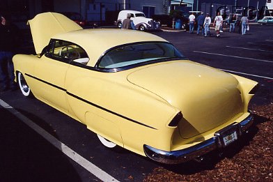 025.A pair of seriously chopped and channeled Hot Rods.JPG