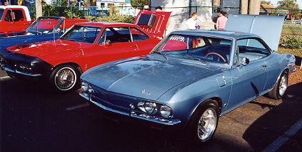 045.Or this pair of mint condition, Nader-hater Chevy Monza Corvairs.JPG