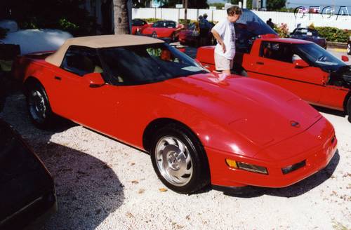 018.Gary and Lucy have their '96 polished all the way down to the tire treads.JPG