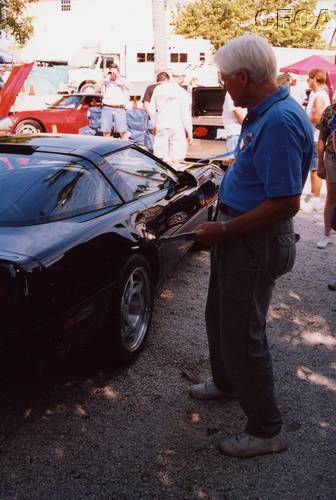 060.Dave is having difficulty finding even a speck of lint on this car.JPG