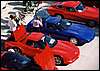 010.BJ, Barry and Mark all work on their cars, while JoAnn looks on.JPG