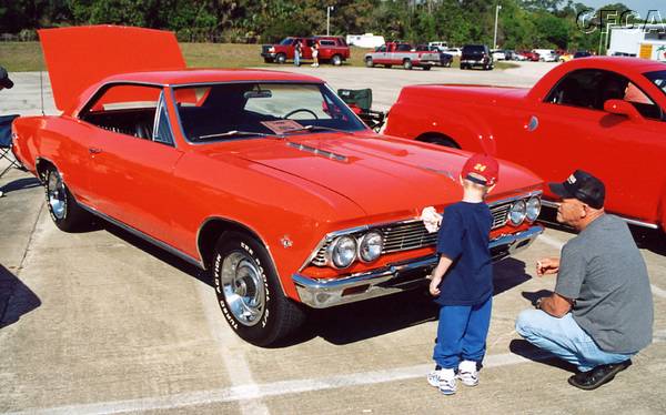 032.Dad was teaching junior the finer points of 'wax on, wax off'.JPG
