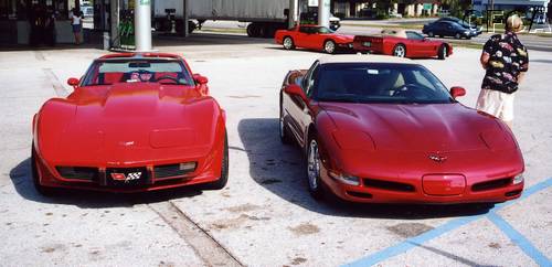 004.Bill watches over his '02 and Tyson's '79.JPG