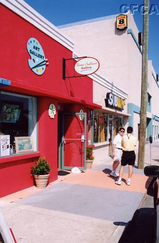 016.Bill consoled BJ, while Patty shopped the Art Galleries.JPG