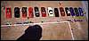 051.CFCA's 12 + 1 Corvettes and the big guy's shadow.JPG