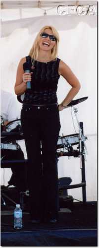 024.The lovely and talented Margo Rochelle kept the crowd's attention.JPG