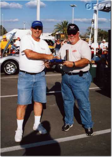 040.Hutch accepting his and Patti's award for the C4 Best in Class.JPG