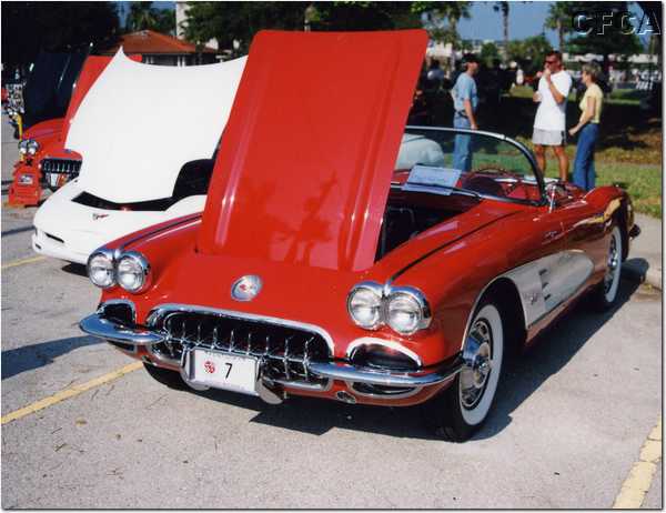 008.Oh, and Mark's Roman Red '59 over yonder.JPG