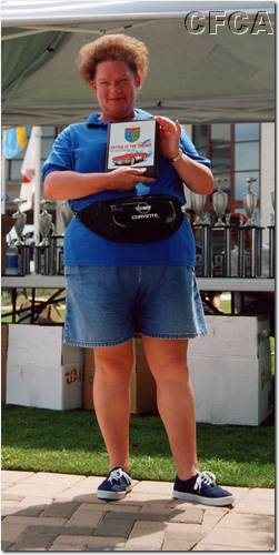 018.Linda and her and Bill's Top 40 plaque.JPG